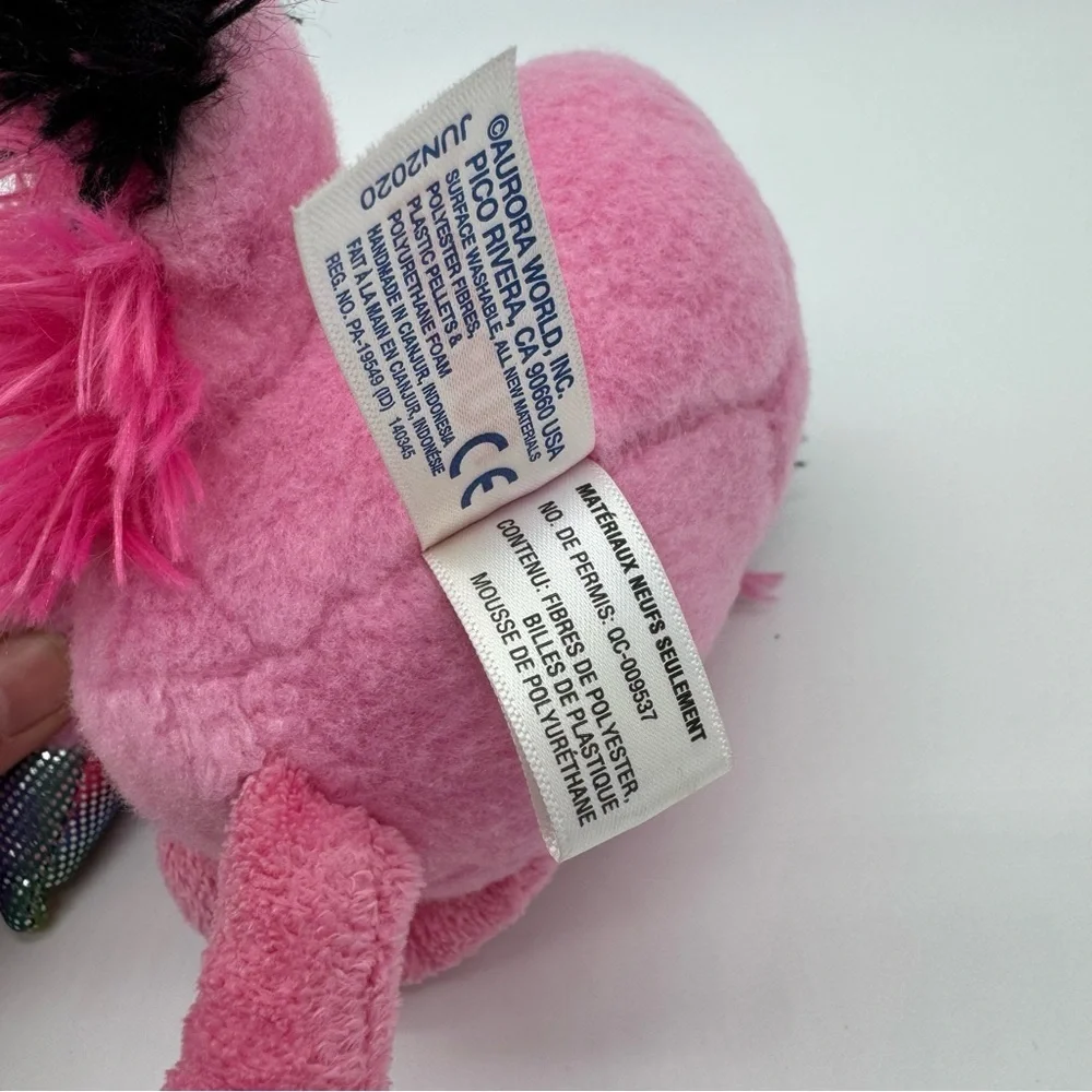 Pink Stuffed Animal Toy with Rainbow Beak